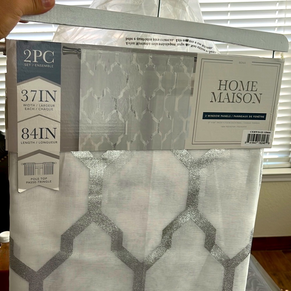 2 sets of 2 window curtains.